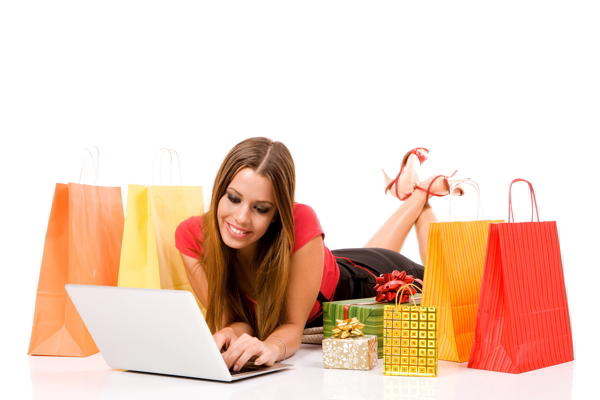 Beautiful young woman shopping over internet.